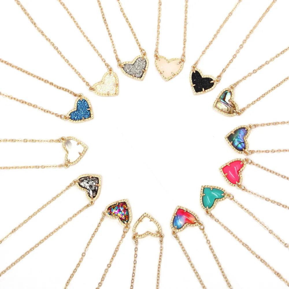 "Introducing our latest Valentine's gift: Candy-colored Claw Small Heart-Shaped 3D Resin Mini Love Pendants Necklace for Women. It's a charming addition to any outfit."