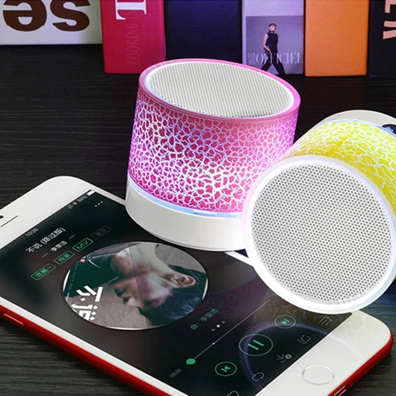 A9 Mini Portable Speaker: Bluetooth, dazzling LED lights, subwoofer, TF/SD card support, and USB charging—for versatile audio enjoyment.