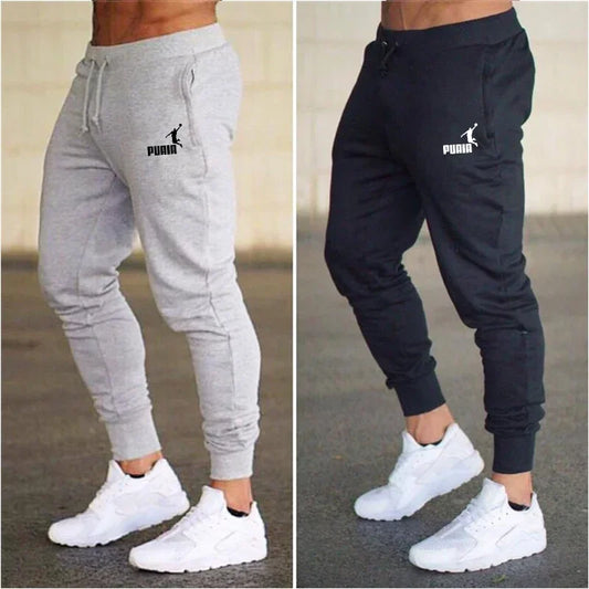 \Introducing our Spring and Summer collection of Men's Casual Trousers. Perfect for sport or leisure, these sweatpants offer a touch of Harajuku Streetwear style to your wardrobe.