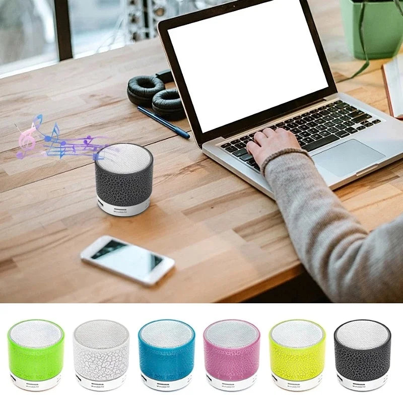 A9 Mini Portable Speaker: Bluetooth, dazzling LED lights, subwoofer, TF/SD card support, and USB charging—for versatile audio enjoyment.