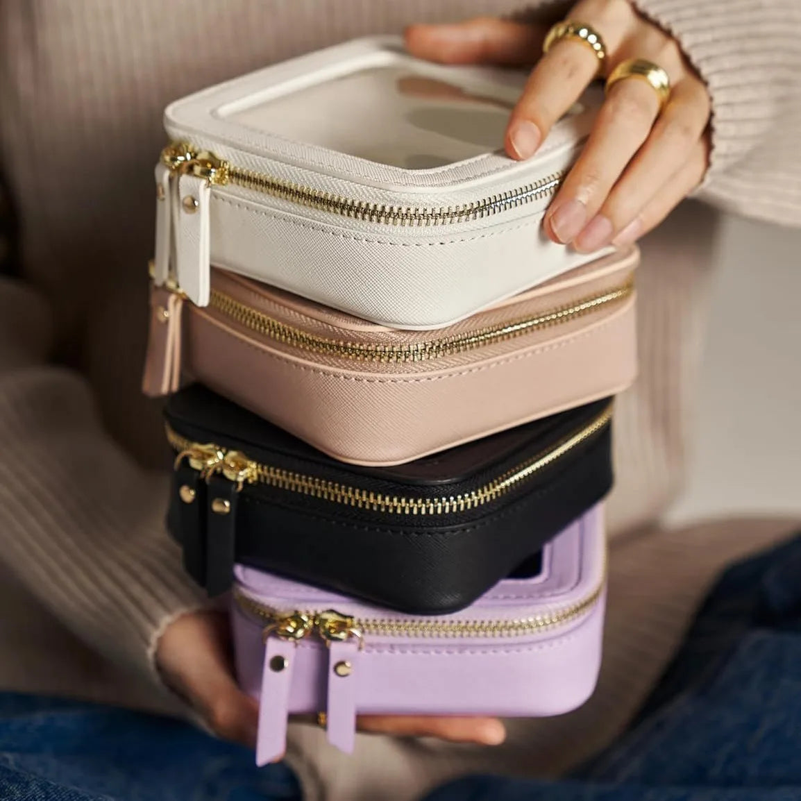Introducing the Mini Clear Makeup Bag—crafted from PU Saffiano vegan faux leather, perfect for storing lipsticks and cosmetics in your purse.