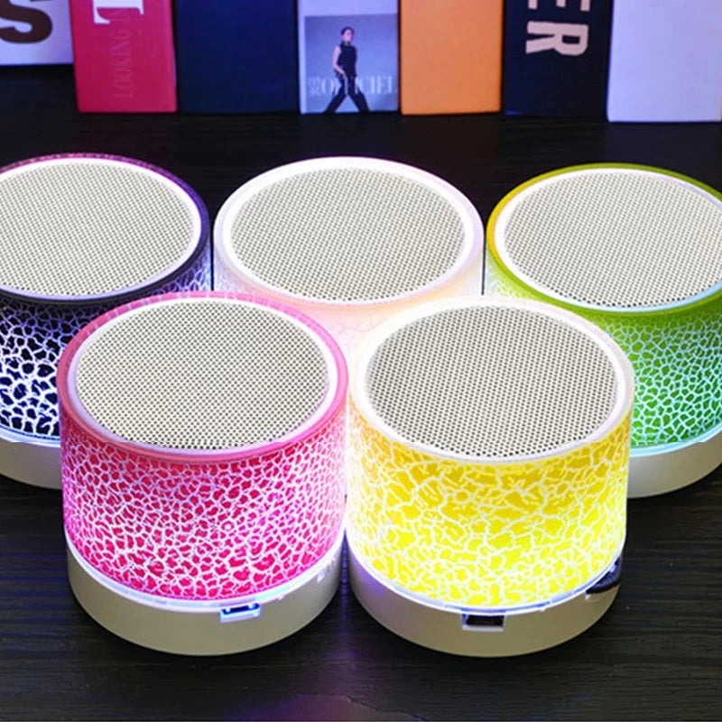 A9 Mini Portable Speaker: Bluetooth, dazzling LED lights, subwoofer, TF/SD card support, and USB charging—for versatile audio enjoyment.